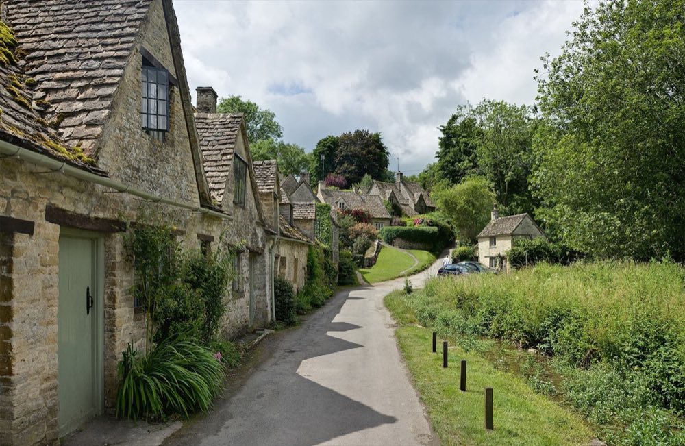Arlington Row, a terrace of steep-roofed stone weavers' cottages in Bibury